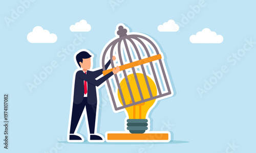 Businessman lifting and opening a cage to release a glowing light bulb as a metaphor for freeing business ideas and creative thinking illustration