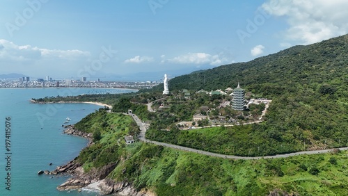 Photos Linh Ung Pagoda, Son Tra Peninsula, Da Nang, Vietnam – 4K aerial drone footage of Buddhist temple, Lady Buddha statue, coastal mountains, tropical bay, city skyline in distance