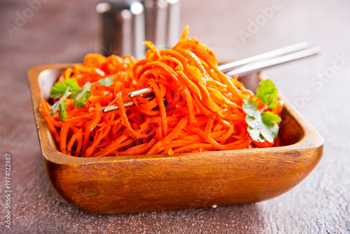 Carrot salad. French Grated Carrot Salad. Shredded carrot with garlic and black pepper