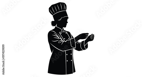 A chef preparing food hands outstretched in a striking silhouette
