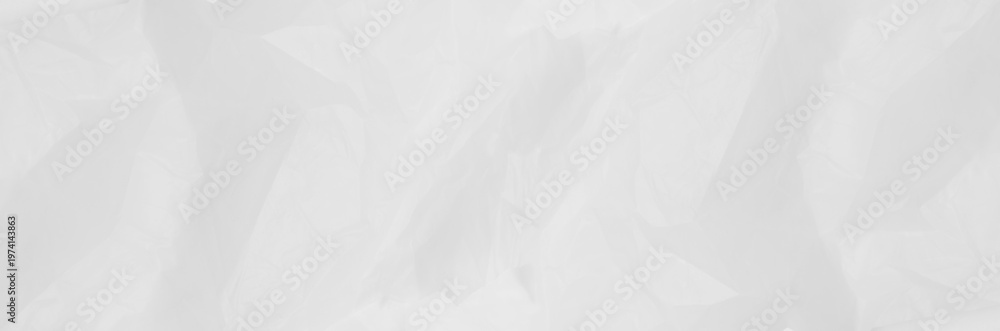 Fototapeta premium Panoramic white crumpled paper texture with subtle folds and highlights. This clean, high-resolution grunge background is perfect for minimalist banners creative headers and website overlays