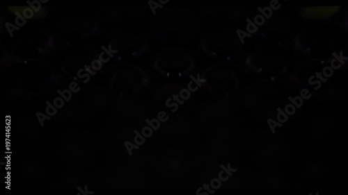 multicolored light through a perforated surface