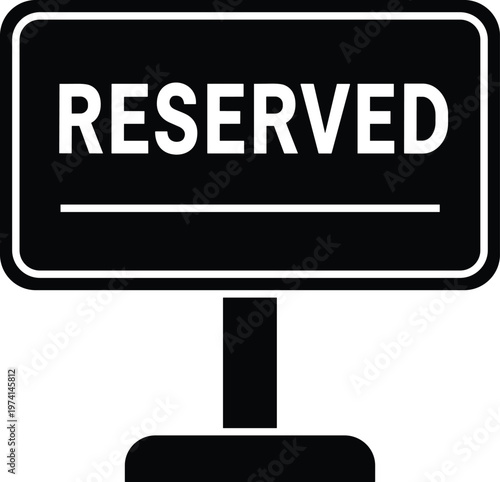 Black sign with text reserved and stand for parking and booking.