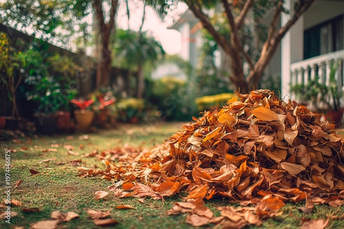 Pile of dry leaves on lawn in autumn, copy space for text