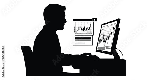 Man analyzing stock market data on computer a striking silhouette