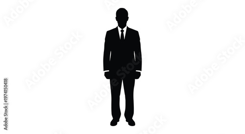 A formal business professional stands poised depicted as a dark silhouette