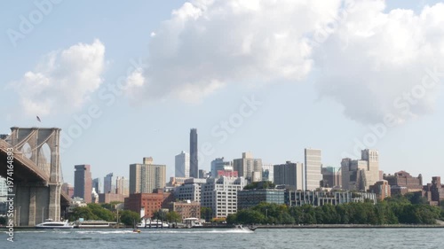 New York City Brooklyn Heights skyline from Manhattan, United States. Riverfront residential district near Dumbo and Brooklyn Bridge cityscape. East river water from esplanade. Waterfront buildings.