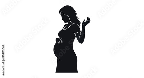 Pregnant woman in a graceful pose depicted in dark silhouette