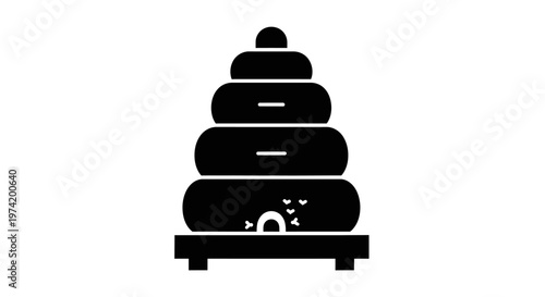 Black stacked stone zen garden sculpture.