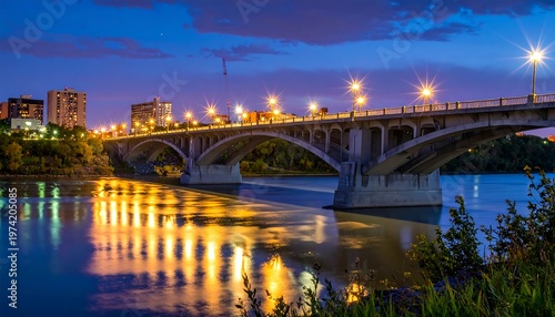 A serene cityscape at dusk featuring a bridge over a calm body of water