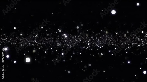 A field of glittering lights twinkle against a dark backdrop.