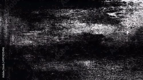 Abstract black and white textured background with a grunge effect.