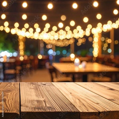 A wooden table in a blurred restaurant setting with string lights (1)