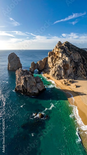 Aerial view of a pristine beach with large rock formations