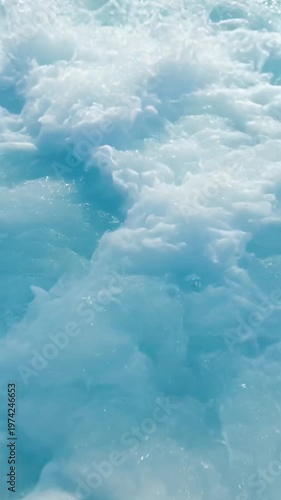 Ocean waves merging in beautiful symmetry