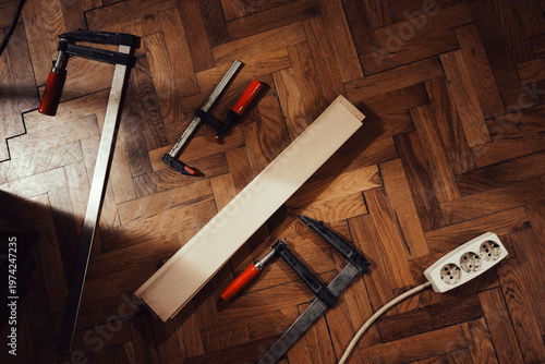 Clamps and electric plug on the floor