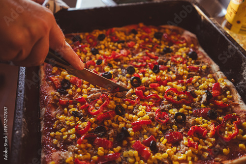 Homemade pizza with vegetables and fish