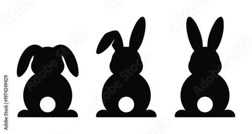 Easter bunny silhouette set, black rabbit icons with fluffy tails, minimalist animal vector collection for spring holiday cards and crafts
