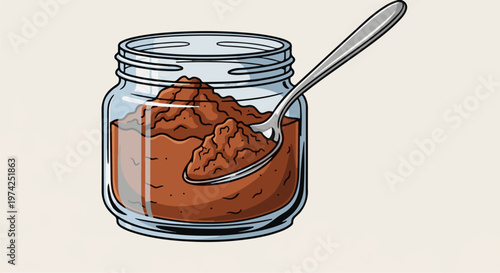 A metallic spoon scoops rich brown powder from a clear glass jar
