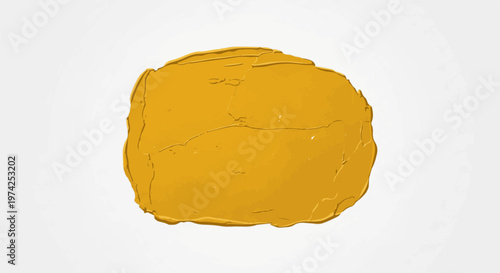 A rough-textured, golden-yellow blob with irregular edges, suggesting natural or organic form