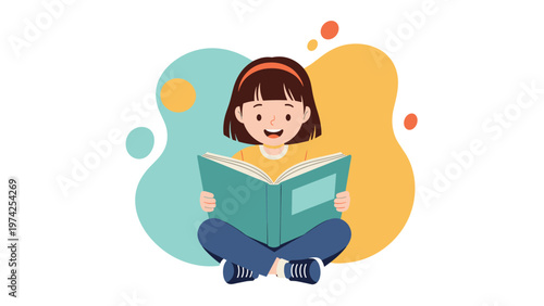 Cheerful young girl sitting cross-legged on the floor focused on reading a large green book with a colorful background.