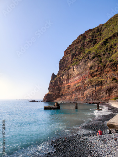 Coastal Cliffs and Pier in the small coastal village Madalena do Mar (Madeira, Portugal)