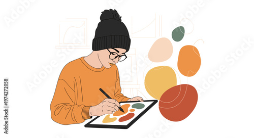 Creative artist in cozy minimalistic workspace with warm color palette on digital drawing tablet for graphic design