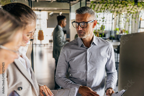 Product manager conducting ux design review in collaborative space