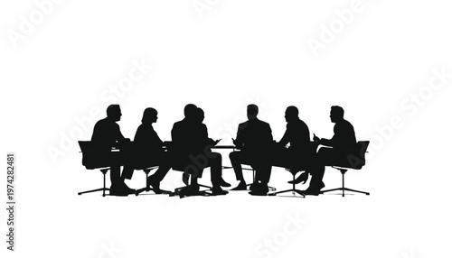 Business colleagues gather around a circular table, actively participating in a focused group discussion.