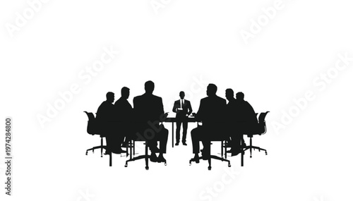 Business executives gather around a table for an important meeting discussion.