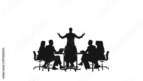 A leader stands before a seated group in silhouette, gesturing with open arms during a presentation.