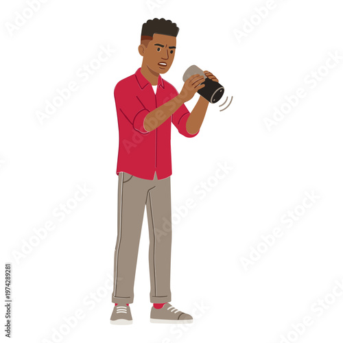 A man takes a photo with his camera indoors.