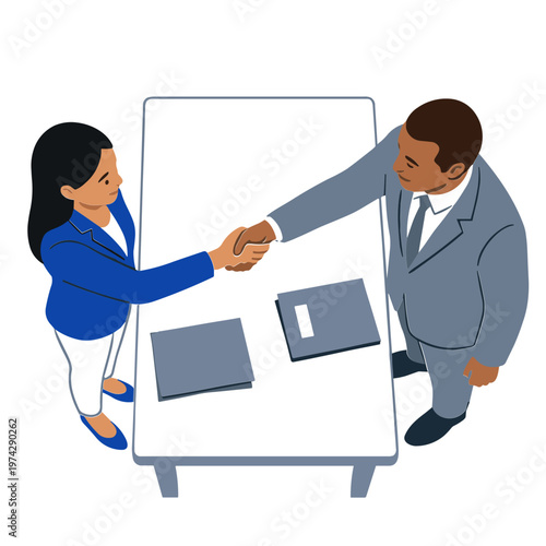 Businesspeople shaking hands over documents on a presentation board indoors