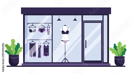 Modern storefront of a retail shop specializing in women's lingerie and clothing with mannequins and racks visible through glass.
