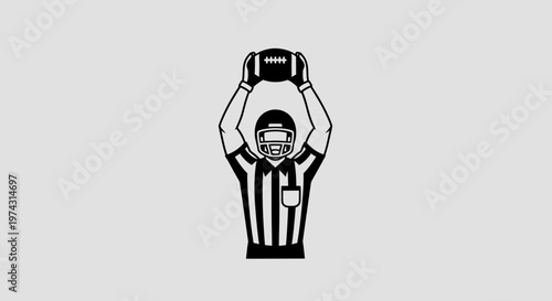 American Football Referee Holding Up The Ball