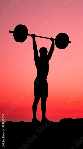 Strong Man Performing Weightlifting at Sunset