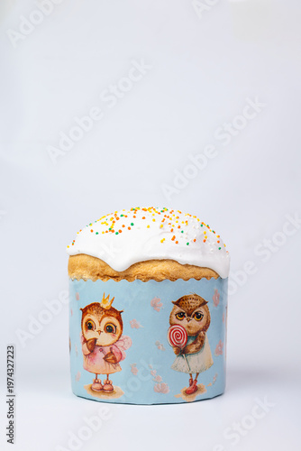 Easter Kulich with White Glaze and Multicolored Sprinkles in Owl Box