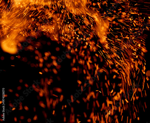 A black background with orange sparks