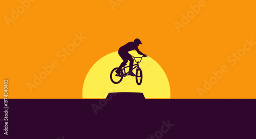 Dynamic Bicycle Rider Silhouette Against Vibrant Sunset