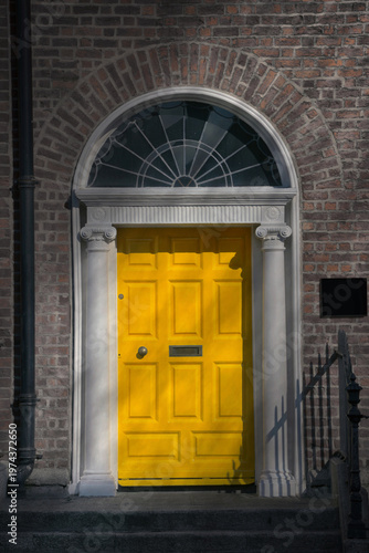 A Yellow Georgian door in Dublin Ireland