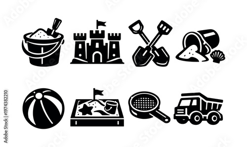 Beach and sand playtime vector silhouette set featuring buckets shovels sandcastles and toys