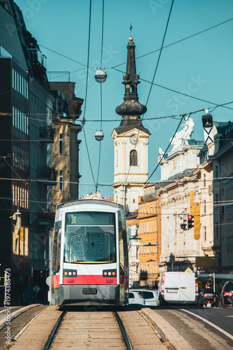 A modern tram on the street of Vienna, Austria.