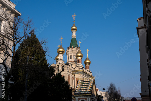 Vienna, Austria – View of the Russian Orthodox Cathedral of Saint Nicholas, showcasing its traditional golden domes and colorful architectural details from a distance.