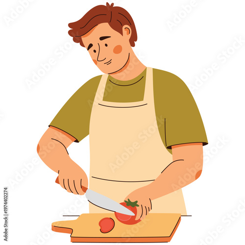 A smiling man in apron slices a tomato on a board. A cozy home cooking scene featuring healthy food