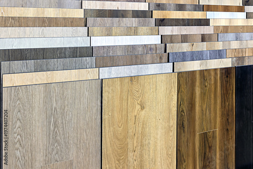Different types of wood flooring samples shown in a store display for customers to choose from in a home improvement location