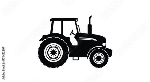 A black silhouette of a modern agricultural tractor against a white background
