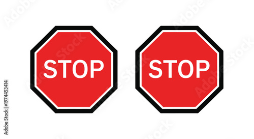 Two identical octagonal red stop signs with white lettering displayed