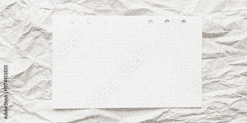 Black noisy surface with grain and sheets of crumpled grid paper. Dotted halftone effect, distressed texture with subtle notebook page.