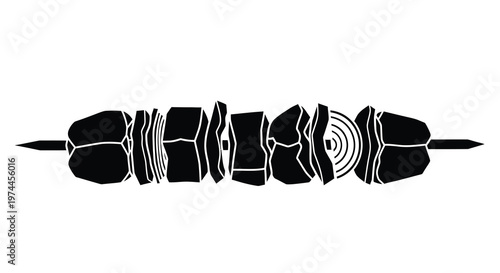 Black and white illustration of a kebab skewer with meat and vegetables