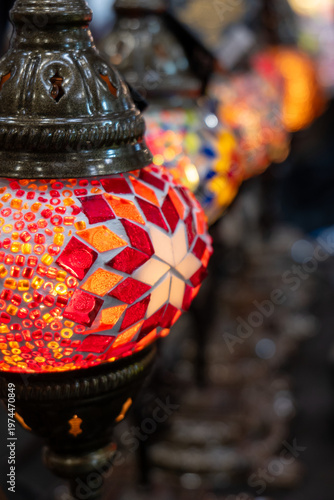 Traditional oriental hanging lamps and decorative ethnic crafts in a boutique market.